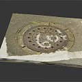 Manhole Cover On Cracked Road Surface Slab With Metal Grid And Holes