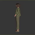 Woman In Green Blouse And Green Pants With Short Brown Hair On Gray Background