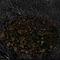 Rocky Terrain With Mixed Size Stones Gravel And Green Mossy Plants