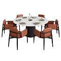 Stylish Round Marble Tabletop Table And Chair Set With Brown Chairs Plates And Glasses