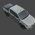 Toyota Pickup Truck With Beige Exterior Bold Grille LED Headlights And Rugged Black Wheels