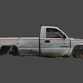 White Damaged Pickup Truck With Crushed Front End And Dented Body