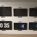 Different Size Televisions With Time Display And Gradient Screen Panels