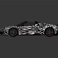 White Convertible Sports Car With Black Roof Sleek Design And Red Emblem