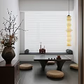 Minimalist Tea Room Interior With Low Table Cushions Vases And Hanging Lamp