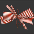 Decorative Ornament Set with Red and White Striped Bow Shiny and Reflective on Dark Surface