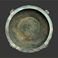Ancient Bronze Basin With Animal Head Handles And Ornate Surface Design