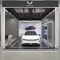 Car Dealership Showroom Showcasing White Car With Modern Lighting And Display Screen