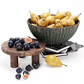 Fresh Yellow Pears in Green Bowl with Purple Figs on Wooden Stand and Books