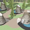 Modern Boutique Hotel Buildings With Conical Perforated Design Surrounded by Water Ponds and Greenery