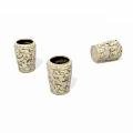 Three Cream Colored Ceramic Vessels With Intricate Patterns Two Upright One Tilted 3d model