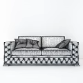 Elegant Gray Tufted Two Seater Sofa With Dark Paneled Walls Herringbone Floor And Pillows