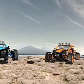 Two Off-Road Vehicles Parked On Scenic Rocky Ground With Mountains And Sky