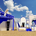 Blue Sailboats Art Installation with Blue Sky White Clouds Sandy Beach and Flying Birds