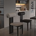 Modern Dining Chairs In Open Kitchen With White Upholstered Seats Black Frames And Marble Countertop