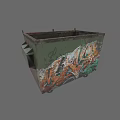 Green Metal Trash Bin With Colorful Graffiti Art On Side