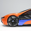 Sleek Orange And Blue Sports Car With Black Wheels And Aerodynamic Design