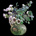 Round Glass Vase With Purple Pink White Flowers And Green Leaves