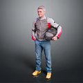 A Man Wearing Gray Jacket With Red Sleeves Holding Black Helmet Standing Against Dark Background