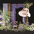 Romantic Floral Installation with Purple Drapery Wooden Arch Green Plants and Love Fairy Sign