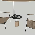 Outdoor Table with Round Black Tabletop Umbrella Two Wooden Striped Chairs and Drinks