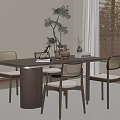 Wooden Dining Table With Woven Backrest Chairs Vase Books Potted Plant And Window Blinds