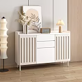 Modern White Sideboard With Vertical Slats Design And Decorative Items In Living Room
