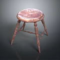 Vintage Wooden Stool With Worn Round Seat And Four Rustic Legs Design