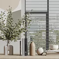 Stylish Decorative Ornament Set With Green Plant Vase Books And Ceramic Pieces On Modern Windowsill