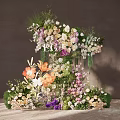 Elegant Floral Installation With Mixed Colorful Blooms Greenery And Layered Design