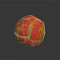 Vibrant Red And Yellow Fruit Ball With Cracked Surface On Black Background