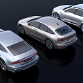 Three Silver Audi Cars Showcase Modern Exterior Design And Different Models