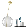 Modern Bathroom Accessories With Toothbrushes Toothpaste Cup And Glass Vase
