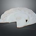 Artistic White Sculpture Carving With Intricate Patterns And Fan Shaped Design