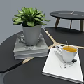 Black Coffee Table With Wooden Legs Geometric Lines Succulent Plant Books And White Tea Cup