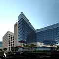 Modern Tall Hospital Building With Glass Facade Evening Lighting Plaza And Palm Trees