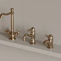 Golden Faucets In Three Different Styles On Light Colored Countertop 3d model