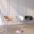 Modern Table And Chair Set With Round Woven Rug Potted Plant And Decorative Painting