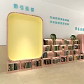 School Reading Area and Biology Corner Featuring Books Green Plants Bookshelves Pink Yellow Wall Text