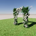 Decorative Archway Adorned With White Flowers And Green Plants On Green Grass Under Blue Sky