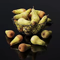 Fresh Ripe Pears in Metal Wire Basket with Scattered Ones on Black Background