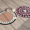 Round Rugs With Brown Center Pink Black Diamond Pattern And Decorative Edges On Wooden Floor