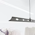 Clothes Hangers with Hanging Garments and Overhead Linear Lights in White Minimalist Space