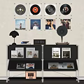 Modern Black Shelving Unit with Table Lamp Books Vinyl Records and Photos in Room