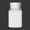 Transparent Glass Salt And Pepper Shakers With Silver Lids And Reflections On Dark Background