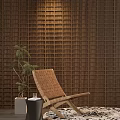 Stylish Woven Leisure Chair Against Wooden Lattice Wall with Potted Plant and Side Table