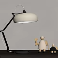 Modern Table Lamp With White Lampshade Metal Arm And Black Base With Decorative Figurines