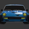 Blue Sports Car With Custom Black Graphics Yellow Headlights Black Wheels And Rear Spoiler
