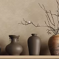 Various Shaped Ceramic Vessels In Earth Tones Displayed On Wooden Shelves