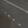 Road Infrastructure With Asphalt Pavement White Traffic Lane Markings And Dividers